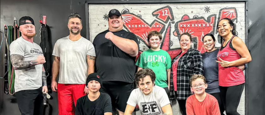Group Fitness class members group photo at Empower Fitness.