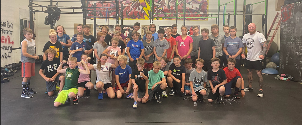 Empower Fitness kids summer camp group photo.